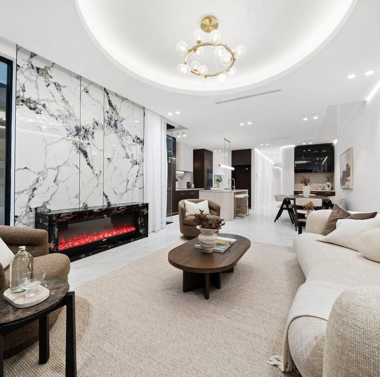 Living-room joinery and stone fireplace